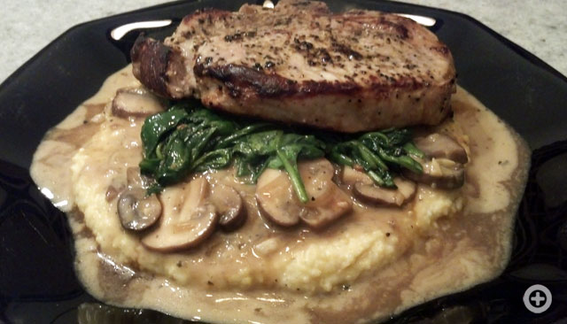 Pork Chop au Poivre, Mushroom Ragu, Wilted Baby Spinach and Creamy Polenta