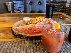HUSK Bloody Mary (22 Ingredients): Cathead Vodka, Country Ham, House Made Pickle