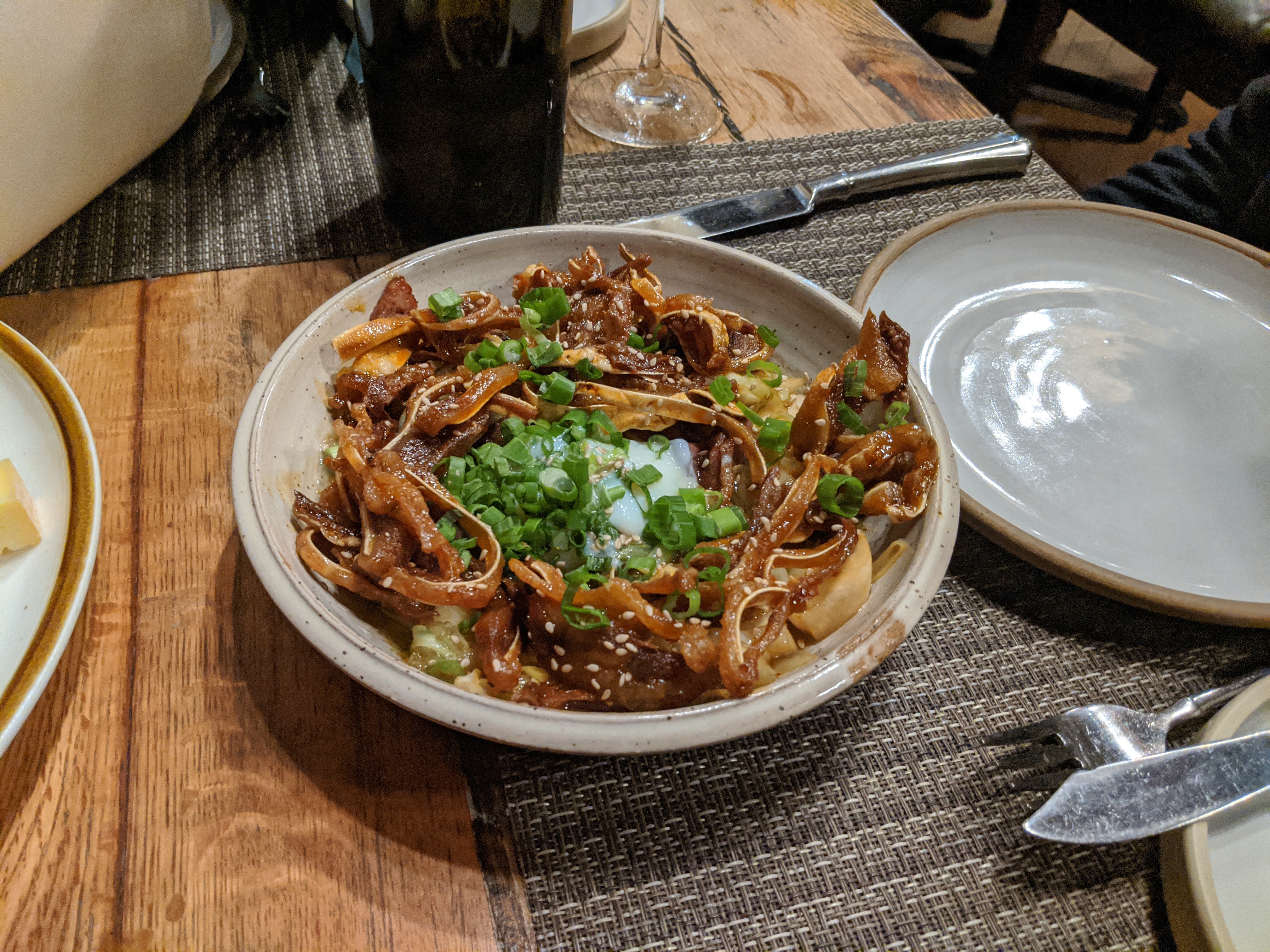 Crispy Pig Ears, Pan Fried Cabbage, Turnips, Poached Egg, Five Spice Sausage, Soy Broth, Scallion