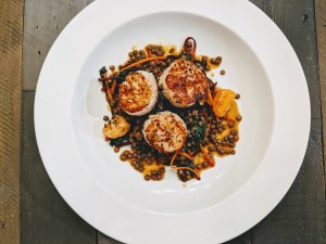 Seared Scallops, French Green Lentils, Rainbow Chard, Purple Carrots with a Satsuma and Soy Vinaigrette