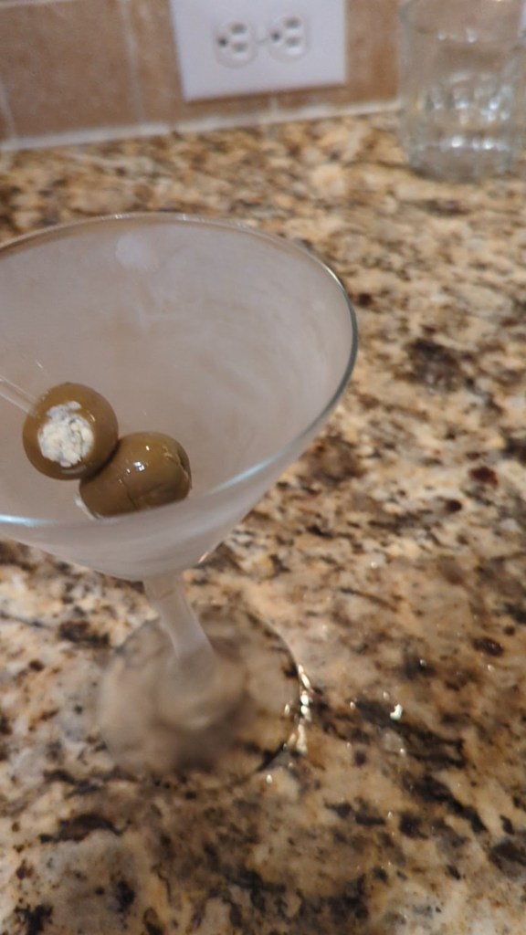 Frozen Martini Glass with Smoked Blue Cheese Stuff Olives