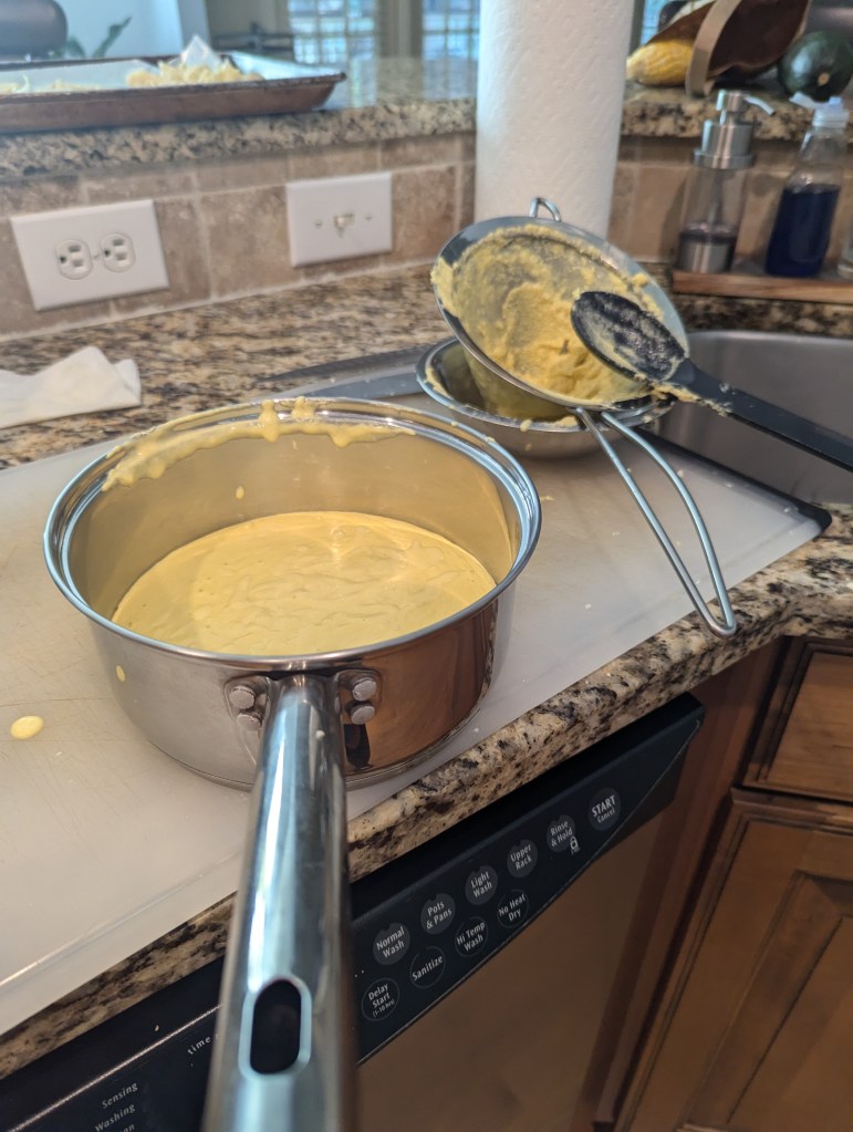 Corn Soubise, strained through a mesh strainer.