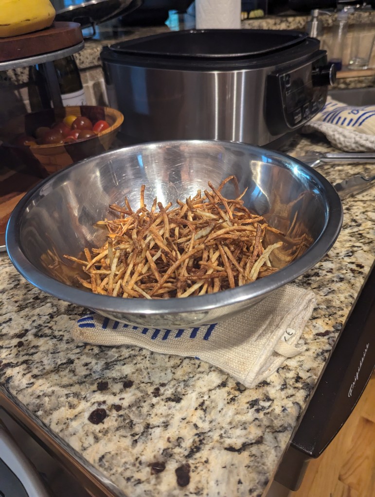 Two batches of Duck Fat Skinny Fries with Truffle Sea Salt. - 2