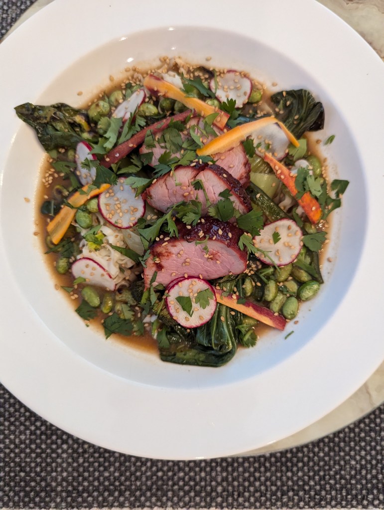 Sous Vide Red Pork (char siu), Blistered Edamame + Steamed Bok Choy, Ramon, Pickled Carrots and Radish, Cilantro, Fried Shallot with Miso Broth - Top