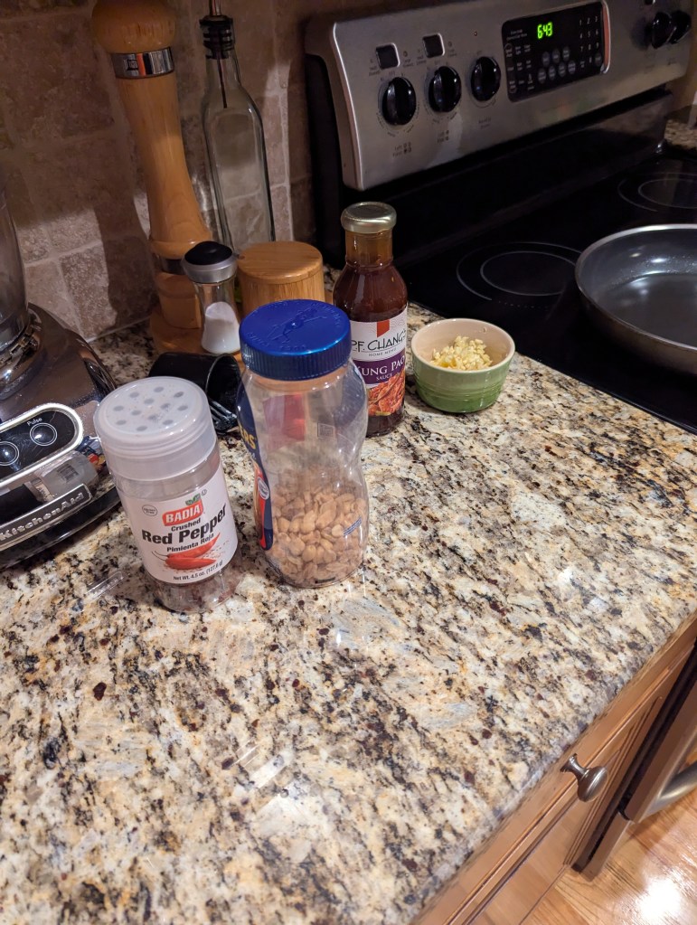 PF Chang's Kung Pao sauce + Peanuts and crushed red pepper