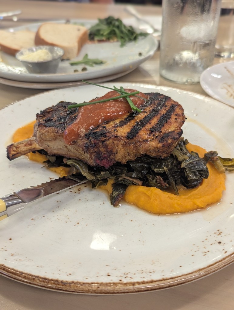 Grilled Pork Chop, Collard Greens, Sweet Potato Puree and House BBQ Sauce - 2025